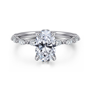Gabriel & Co. ER16414O6W44JJ 14 karat white gold Contemporary engagement ring, front view of an oval center on four prongs with elongated stones running down each shoulder