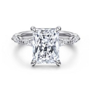 Gabriel & Co. ER16416N16W43JJ 14 karat white gold Contemporary engagement ring, front view of the radiant cut center with elongated diamonds pointing along the band