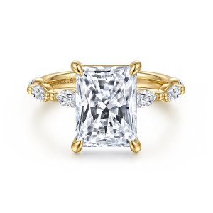 Gabriel & Co. ER16416N16Y43JJ 14 karat yellow gold Contemporary engagement ring, front view of a radiant cut center with a prong at each corner and pointed stones beside it