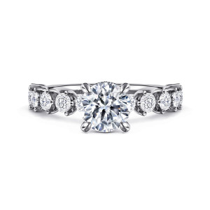 Gabriel & Co. ER16419R4W44JJ 14 karat white gold Contemporary engagement ring, front view of a round center in four prongs between separately mounted round band diamonds