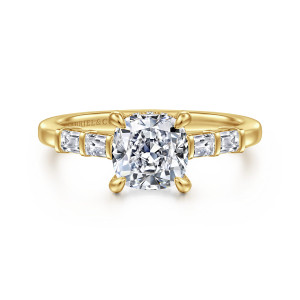 Gabriel & Co. ER16423C6Y44JJ 14 karat yellow gold Contemporary engagement ring, front view of a cushion center between baguette stones set lengthwise along the shoulders