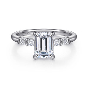 Gabriel & Co. ER16423E6W44JJ 14 karat white gold Contemporary engagement ring, front view of an emerald cut center with two bar set baguettes on each side of the head