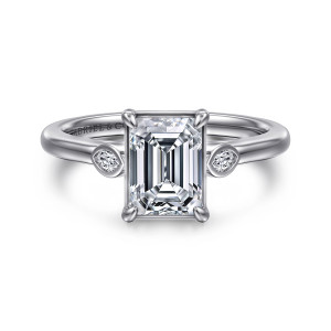 Gabriel & Co. ER16429E6W43JJ 14 karat white gold Contemporary engagement ring, front view of an emerald cut center in four prongs between two small bezel set diamonds