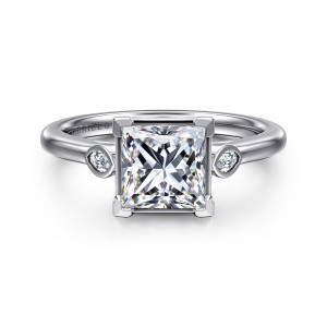 Gabriel & Co. ER16429S6W43JJ 14 karat white gold Contemporary engagement ring, front view of a princess cut center with a small bezel framed stone on each side
