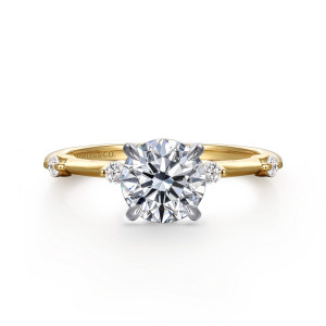 Gabriel & Co. ER16431R4M44JJ 14 karat white and yellow gold Contemporary engagement ring, front view of a round center with a small round stone set close beside it on each shoulder