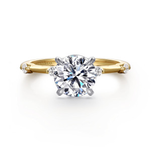 Gabriel & Co. ER16431R6M44JJ 14 karat white and yellow gold Contemporary engagement ring, front view of a round center in four prongs with small round diamonds spaced along a slim band