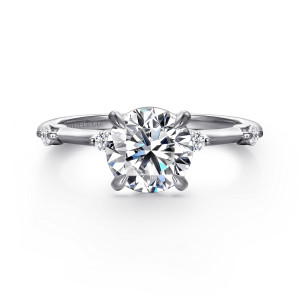 Gabriel & Co. ER16431R6W44JJ 14 karat white gold Contemporary engagement ring, front view of a round center in four prongs with a small diamond beside the head
