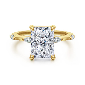 Gabriel & Co. ER16432N12Y43JJ 14 karat yellow gold Starlight engagement ring, front view of a tall rectangular center with trimmed corners and pointed diamonds on each shoulder