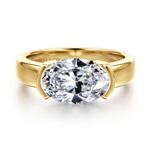 Gabriel & Co. ER16433O12Y4JJJ 14 karat yellow gold Contemporary engagement ring, front view of an oval center lying sideways between two curved tabs on a wide band