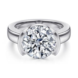 Gabriel & Co. ER16433R20W4JJJ 14 karat white gold Contemporary engagement ring, front view of a round center gripped by curved walls at left and right