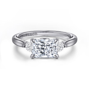 Gabriel & Co. ER16435N6W44JJ 14 karat white gold Lotus engagement ring, front view of a sideways rectangular center flanked by round stones on a plain band