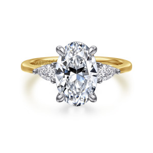 Gabriel & Co. ER16437O10M44JJ 14 karat white and yellow gold Classic engagement ring, front view of an oval center with pear shaped diamonds pointing outward and four rounded prongs