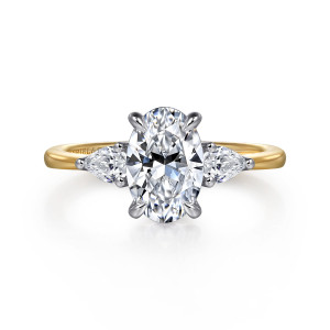 Gabriel & Co. ER16437O6M44JJ 14 karat white and yellow gold Classic engagement ring, front view of an oval center between pear shaped stones pointing outward along the band