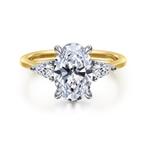 Gabriel & Co. ER16437O8M44JJ 14 karat white and yellow gold Classic engagement ring, front view of an oval center between elongated side stones with pointed outer ends