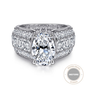Gabriel & Co. ER16445O10W44JJ 14 karat white gold Contemporary engagement ring, front view of an oval center between wide shoulders of baguettes and square stones