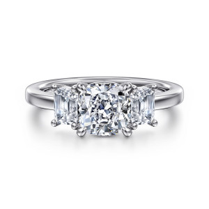 Gabriel & Co. ER16463C6W43JJ 14 karat white gold Classic engagement ring, front view of a cushion cut center with a step cut stone in prongs on each side