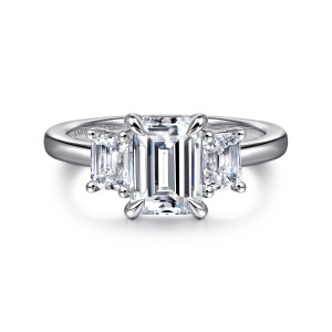 Gabriel & Co. ER16463E6W43JJ 14 karat white gold Classic engagement ring, front view of an emerald cut center between two step cut stones with ball tipped corner prongs