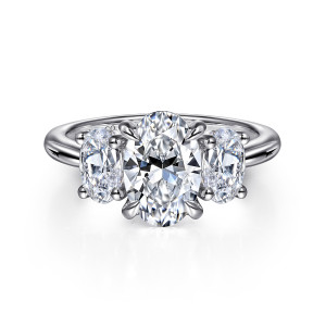 Gabriel & Co. ER16465O6W44JJ 14 karat white gold Classic engagement ring, front view of the oval center held by four tapered prongs between two upright side ovals