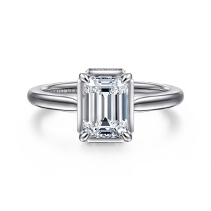 Gabriel & Co. ER16470E6W44JJ 14 karat white gold Contemporary engagement ring, front view of an emerald cut center with small stones just peeking out at the top and bottom