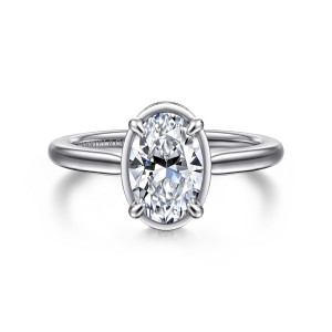 Gabriel & Co. ER16470O6W44JJ 14 karat white gold Contemporary engagement ring, front view of an oval center held by four prongs with a thin polished rim below