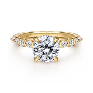 Gabriel & Co. ER16472R6Y44JJ 14 karat yellow gold Contemporary engagement ring, front view of a round center flanked by round diamonds each cupped in a rounded collar