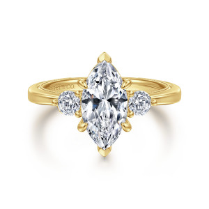 Gabriel & Co. ER16475M6Y44JJ 14 karat yellow gold Classic engagement ring, front view of a marquise center with pointed tip prongs and a round side stone on each side