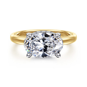 Gabriel & Co. ER16476O12M44JJ 14 karat white and yellow gold Classic engagement ring, front view of a sideways oval center in four prongs with beaded edging on the band