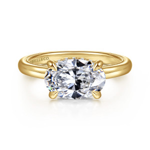 Gabriel & Co. ER16476O8Y44JJ 14 karat yellow gold Classic engagement ring, front view of an oval center turned sideways in four teardrop shaped prongs