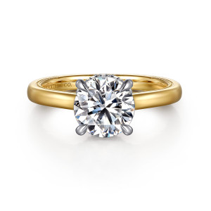 Gabriel & Co. ER16476R8M44JJ 14 karat white and yellow gold Classic engagement ring, front view of a round center in claw prongs with the diamond collar barely peeking out behind it