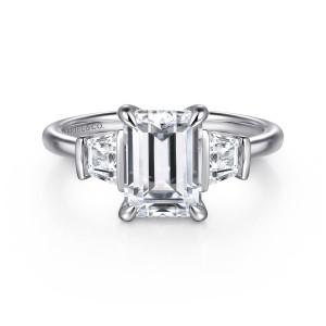 Gabriel & Co. ER16477E8W44JJ 14 karat white gold Classic engagement ring, front view of an emerald cut center between two tapered trapezoid stones held by slim outer bars