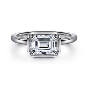 Gabriel & Co. ER16483E6W4JJJ 14 karat white gold Contemporary engagement ring, front view of a sideways emerald cut center in a squared frame with clipped corners