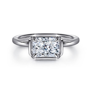 Gabriel & Co. ER16483N6W4JJJ 14 karat white gold Contemporary engagement ring, front view of a sideways rectangular center in a polished frame with angled corners