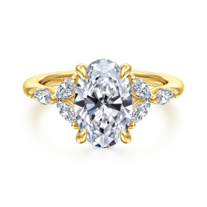 Gabriel & Co. ER16495O10Y43JJ 14 karat yellow gold Floral Nouveau engagement ring, front view of an oval center with leaf like clusters of elongated stones and teardrop shaped prongs