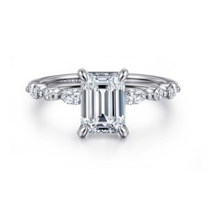 Gabriel & Co. ER16497E6W44JJ 14 karat white gold Contemporary engagement ring, front view of an emerald cut center with beaded, spaced diamonds along both shoulders