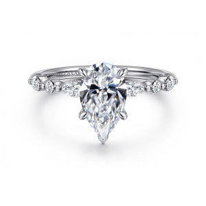 Gabriel & Co. ER16497P6W44JJ 14 karat white gold Contemporary engagement ring, front view of a pear shaped center with its pointed tip and stones spaced along the shoulders
