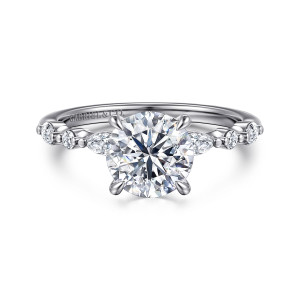 Gabriel & Co. ER16497R6W44JJ 14 karat white gold Contemporary engagement ring, front view of a round center in four claws with alternating stones and beads on each shoulder