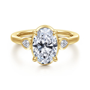 Gabriel & Co. ER16502O8Y44JJ 14 karat yellow gold Contemporary engagement ring, front view of an oval center between two bezel set pear shaped side stones