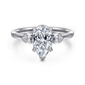 Gabriel & Co. ER16502P6W44JJ 14 karat white gold Contemporary engagement ring, front view of a pear center with a pointed V prong at its tip and bezel side diamonds