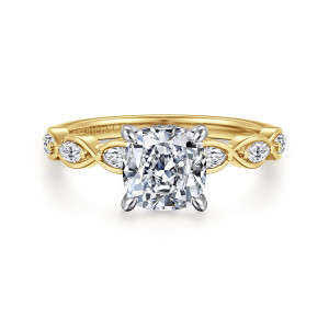 Gabriel & Co. ER16505C6M44JJ 14 karat white and yellow gold Contemporary engagement ring, front view of a cushion center in four rounded prongs with elongated stones in loops at the shoulders