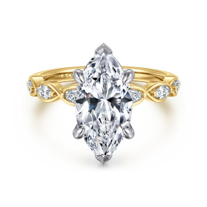 Gabriel & Co. ER16505M12M44JJ 14 karat white and yellow gold Contemporary engagement ring, front view of a marquise center with crossing loops holding elongated diamonds on the shoulders