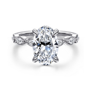 Gabriel & Co. ER16505O10W44JJ 14 karat white gold Contemporary engagement ring, front view of an oval center with four teardrop shaped prongs and crossing loops on the shoulders