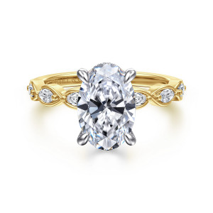 Gabriel & Co. ER16505O8M44JJ 14 karat white and yellow gold Contemporary engagement ring, front view of an oval center in four prongs with looped shoulders on either side