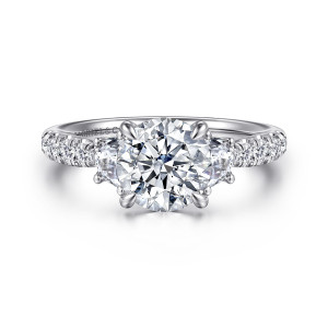 Gabriel & Co. ER16507R6W44JJ 14 karat white gold Lotus engagement ring, front view of a round center flanked by half moon stones with stone lined shoulders