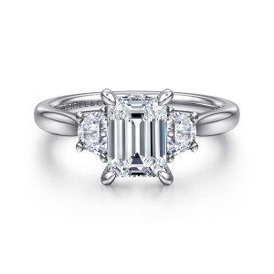 Gabriel & Co. ER16508E6W43JJ 14 karat white gold Lotus engagement ring, front view of the emerald cut center between two half moon stones with pointed claw prongs