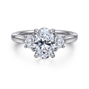 Gabriel & Co. ER16508O6W43JJ 14 karat white gold Lotus engagement ring, front view of an oval center flanked by half moon side stones in slim claw prongs