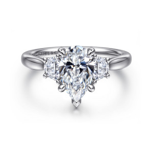Gabriel & Co. ER16508P6W43JJ 14 karat white gold Lotus engagement ring, front view of a pear shaped center with a pointed tip claw between two flat edged side stones