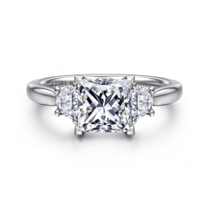Gabriel & Co. ER16508S6W43JJ 14 karat white gold Lotus engagement ring, front view of a princess cut center held at its corners with a side stone on each flank