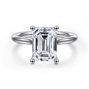 Gabriel & Co. ER16512E12PT4JJ platinum Classic engagement ring, front view of an emerald cut center at the corners of four ball tipped prongs