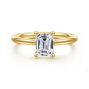Gabriel & Co. ER16512E4Y44JJ 14 karat yellow gold Classic engagement ring, front view of an emerald cut center held by ball tipped prongs on a smooth tapered band