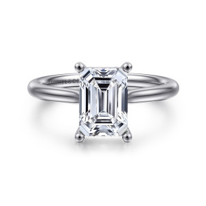 Gabriel & Co. ER16512E8W44JJ 14 karat white gold Classic engagement ring, front view of an emerald cut center held by four ball tipped prongs on a smooth band